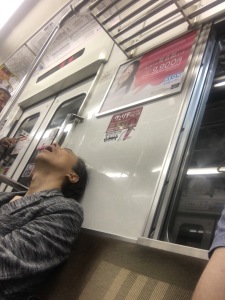 Catching a snooze on the morning train.
